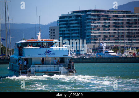A huge tourism reef ferry returns from the Great Barrier Reef, Cairns, Australia Stock Photo