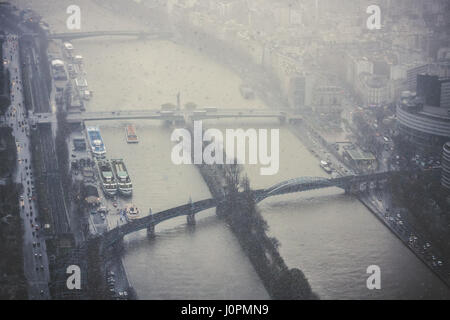 Sudden snowstorm in spring in the French capital. View from Eiffel tower on the Allée des Cygnes, Statue of Liberty, pont Rouelle, pont de Grenelle, p Stock Photo