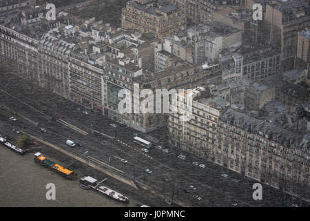 Sudden snowstorm in spring in the French capital. View from Eiffel tower on rue Beethoven, avenue de New York, voie Georges Pompidou, port Debilly and Stock Photo