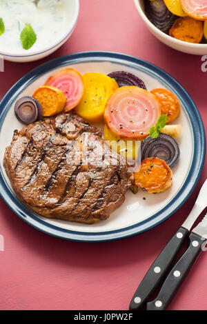Steak with beetroot salad Stock Photo