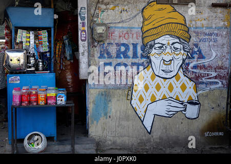 Old lady with coffee mug street art at local coffee shop illustration Rishikesh, Uttarakhand, India Stock Photo