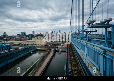 View of the Delaware River and Penn's Landing from the Benjamin Franklin Bridge Walkway in Philadelphia, Pennsylvania. Stock Photo