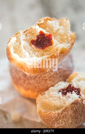 Doughnuts with strawberry jam Stock Photo