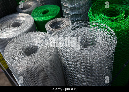 Coil of steel barbed wire isolated on white background Stock Photo - Alamy
