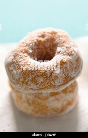 Mini ring doughnuts stacked Stock Photo