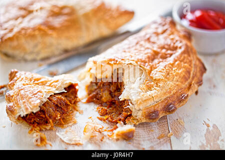 Pulled pork pastry in a barbecue flavoured sauce Stock Photo