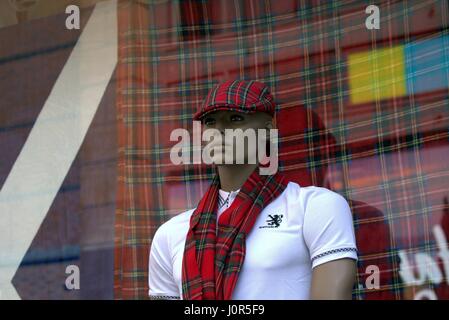 Scotland flag rugby shirt kilt sporran kitsch tartan scarf hat stewart Stock Photo