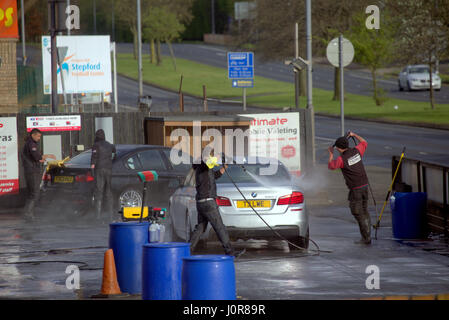 car foam  wash valeting power hoses workers Stock Photo