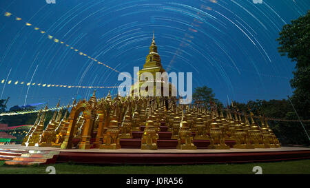 Star trails north polaris with blue sky at night at Wat Pa Sawang Bun, Saraburi, Thailand Stock Photo