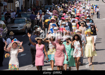 Charleston, South Carolina, USA. 15th Apr, 2017. The annual Hat Ladies Easter Promenade sashay down Board Street in the historic district April 15, 2017 in Charleston, SC. The group honors the tradition of wearing hats and promenades through the historic district to mark the Easter Holiday. Credit: Planetpix/Alamy Live News Stock Photo