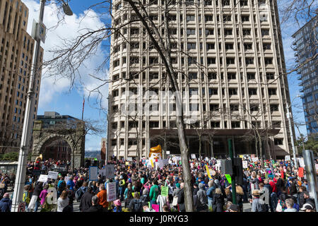 Seattle, Washington, USA. 15th April, 2017. 'Chicken Don' statue appears at the rally at the Henry M. Jackson Federal Building. Hundreds of protestors attended Tax March Seattle, a rally and sister march to the National Tax March taking place in over 180 communities across the U.S. Activists are demanding that President Trump release his tax returns and reveal his business dealings, financial ties, and any potential conflicts of interests. Credit: Paul Gordon/Alamy Live News