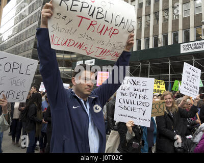 New York City, USA. 15th April, 2017. Thousands of protesters march in The Tax Day March to demand Donald Trump release his taxes so questions about the source of his income and debt and his ties to other governments can be answered. ©Ethel Wolvovitz/Alamy Live News Stock Photo