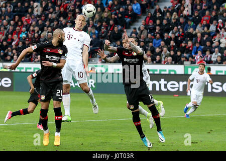Leverkusen. 15th Apr, 2017. Arjen Robben(2nd L) of FC Bayern Munich heads the ball during the Bundesliga soccer match between Bayer 04 Leverkusen and FC Bayern Munich at BayArena Stadium in Leverkusen, Germany on April 15, 2017. The match ended with a 0-0 draw. Credit: Joachim Bywaletz/Xinhua/Alamy Live News Stock Photo