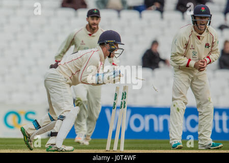 London, UK. 16 April, 2017.  Alex Davies takes off the bails to run out Dominic Sibley on day three of the Specsavers County Championship game at the Oval between Surrey and Lancashire. David Rowe/Alamy Live News Stock Photo