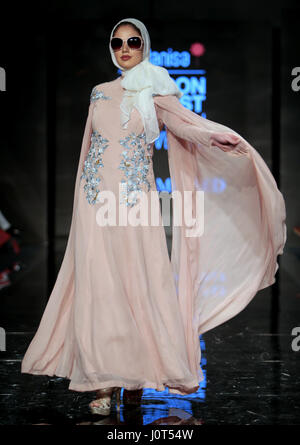 London, UK. 16th Apr, 2017. On the second day of the London Muslim Lifestyle Show 2017 the Modest Fashion Show 3rd runway show of Sunday saw designers Jubahsouq, Myadinda, Saiqa Majeed, Fana Couture Credit: Paul Quezada-Neiman/Alamy Live News Stock Photo