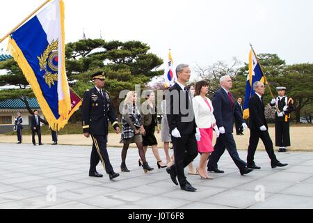 Seoul, South Korea. 16th Apr, 2017. U.S. Vice President Mike Pence, right, accompanied by his wife Karen, center, and Gen. Vincent K. Brooks, left, commander of U.S and U.N. Forces in Korea visit the Seoul National Cemetery April 16, 2017 in Seoul, South Korea. Pence assured South Korea that the U.S commitment to the region has never been stronger following a failed attempt by North Korea to launch a test ballistic missile. Credit: Planetpix/Alamy Live News Stock Photo