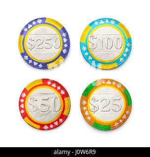 Four Gambling Chips Isolated on a White Background. Stock Photo