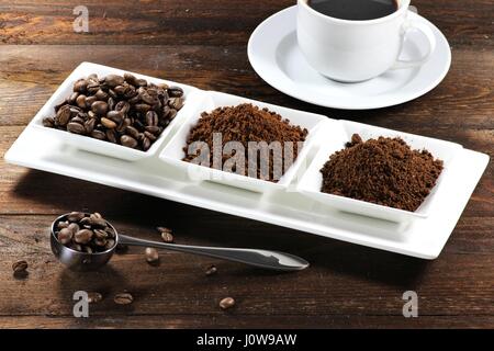 assortment of different coffee products on wooden background Stock Photo