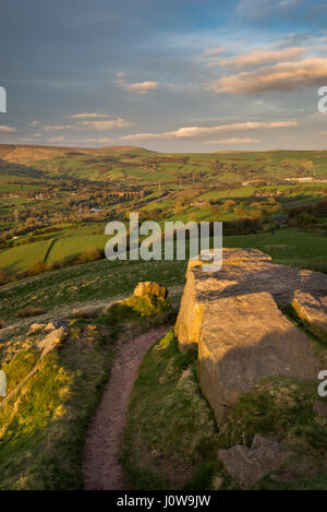 View from the rocky summit of Eccles Pike in the Peak District, Derbyshire, England. A lovely spring evening with view towards Chinley. Stock Photo