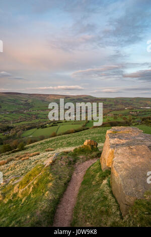 View from the rocky summit of Eccles Pike in the Peak District, Derbyshire, England. A lovely spring evening with view towards Chinley. Stock Photo