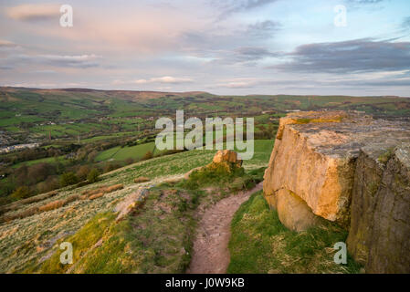 View from the rocky summit of Eccles Pike in the Peak District, Derbyshire, England. A lovely spring evening with view towards Chinley. Stock Photo