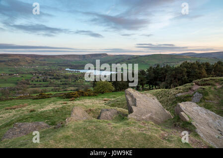 View from Eccles Pike, Derbyshire at dusk. Looking towards Coombs edge and Coombs reservoir in the Peak District national park. A spring evening. Stock Photo