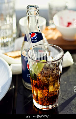 A pepsi glass with ice cold water on a table in a bar Stock Photo ...