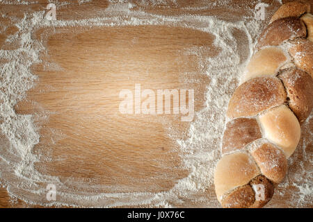 3 kinds interwoven bread lying on a wooden table with copy space. food concept Stock Photo