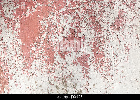 old grungy plastered wall with peeling color Stock Photo