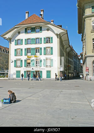 BERN, SWITZERLAND - MARCH 3, 2011: The famous Entrecote Cafe Federal houses in traditional Swiss building in Bundesplatz square, on March 3 in Bern. Stock Photo