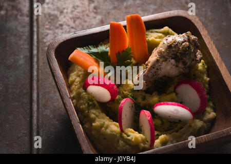 Salad of beans, chicken, carrots, radishes in a bowl horizontal Stock Photo