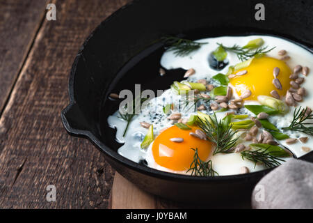 Scrambled eggs  on the wooden table horizontal Stock Photo