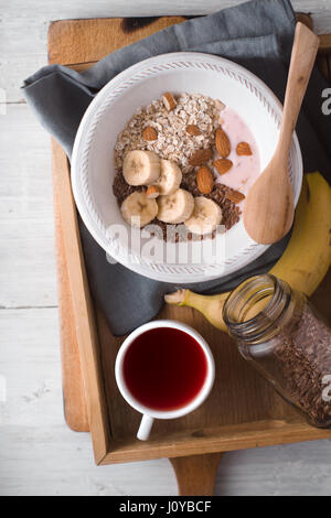 Healthy breakfast on the wooden tray  vertical Stock Photo