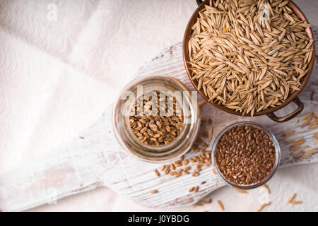 Different grain on the white table Stock Photo