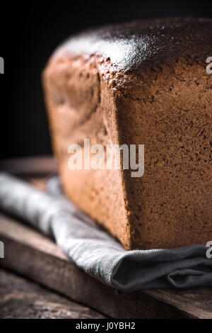 Rye bread on the wooden board vertical Stock Photo