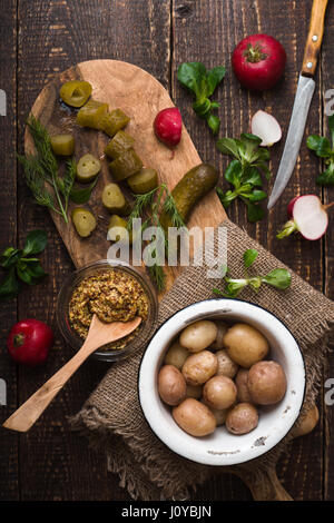 Ingredients for rustic vegetable salad on the wooden table Stock Photo