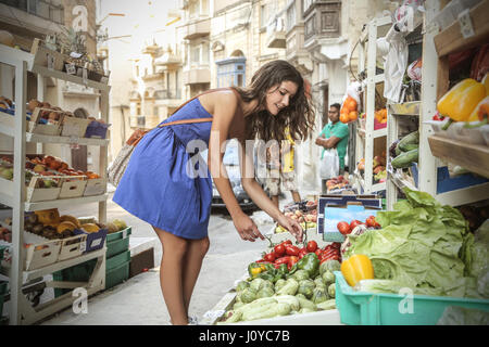 Young woman shopping groceries Stock Photo