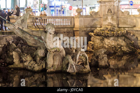 The famous Triton Fountain in Dusseldorf, Germany Stock Photo