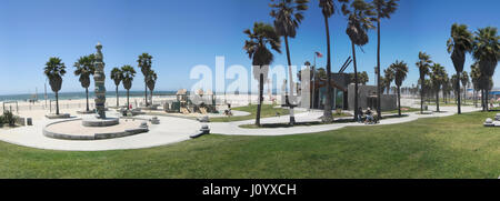 Los angeles, USA - june 2, 2011: Panorama of the venice beach promenade with people and playground in Los Angeles, California. Stock Photo