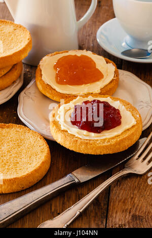 Typical breakfast from Holland with biscuit toast, butter and jam. Stock Photo