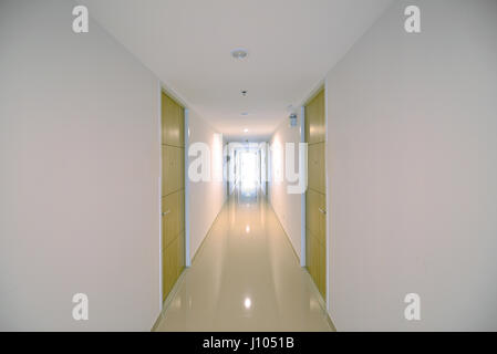 Condo Corridor with wooden doors in condominium, modern design Stock Photo