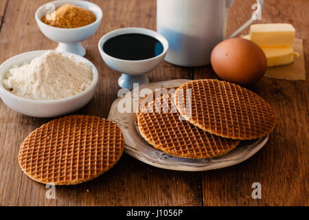 Typical sweet waffles with sugar syrup from Holland. Stock Photo