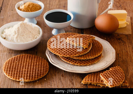 Typical sweet waffles with sugar syrup from Holland. Stock Photo