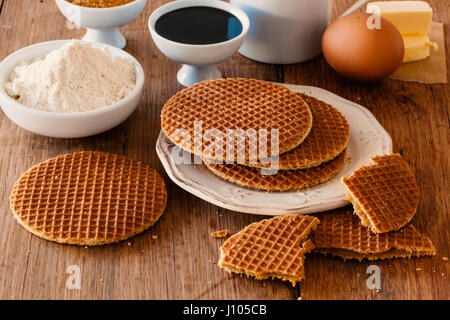 Typical sweet waffles with sugar syrup from Holland. Stock Photo