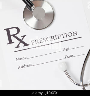 Prescription form with stethoscope over it - close up studio shot Stock Photo