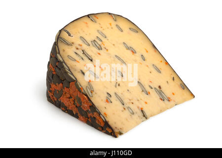 Dutch cheese with pumpkin seeds and carrot on white background Stock Photo