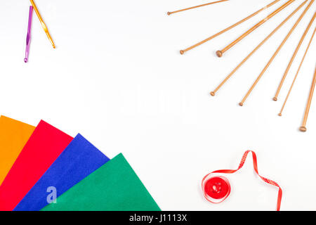 Knitting, sewing and crochet tools on white background Stock Photo