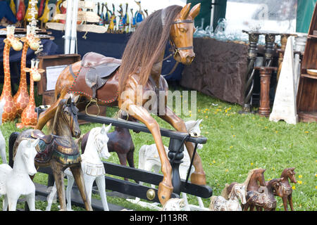 display of wooden rocking horses Stock Photo