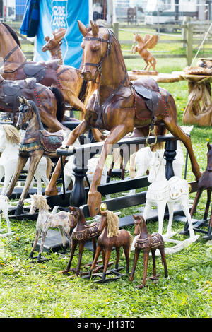 display of wooden rocking horses Stock Photo