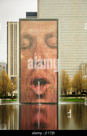 Chicago landmarks, city park, Crown Fountain spouting water on the reflecting pool, Millenium Park, in Chicago, Illinois, USA. Stock Photo